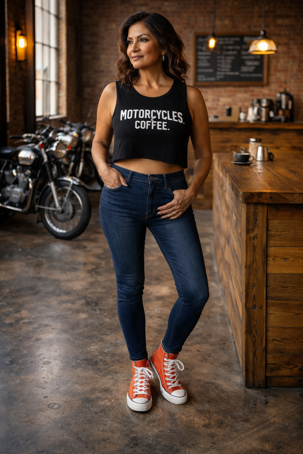 Lightweight and breathable, this women’s crop tank is perfect for coffee runs, bike meets, and everyday urban style.